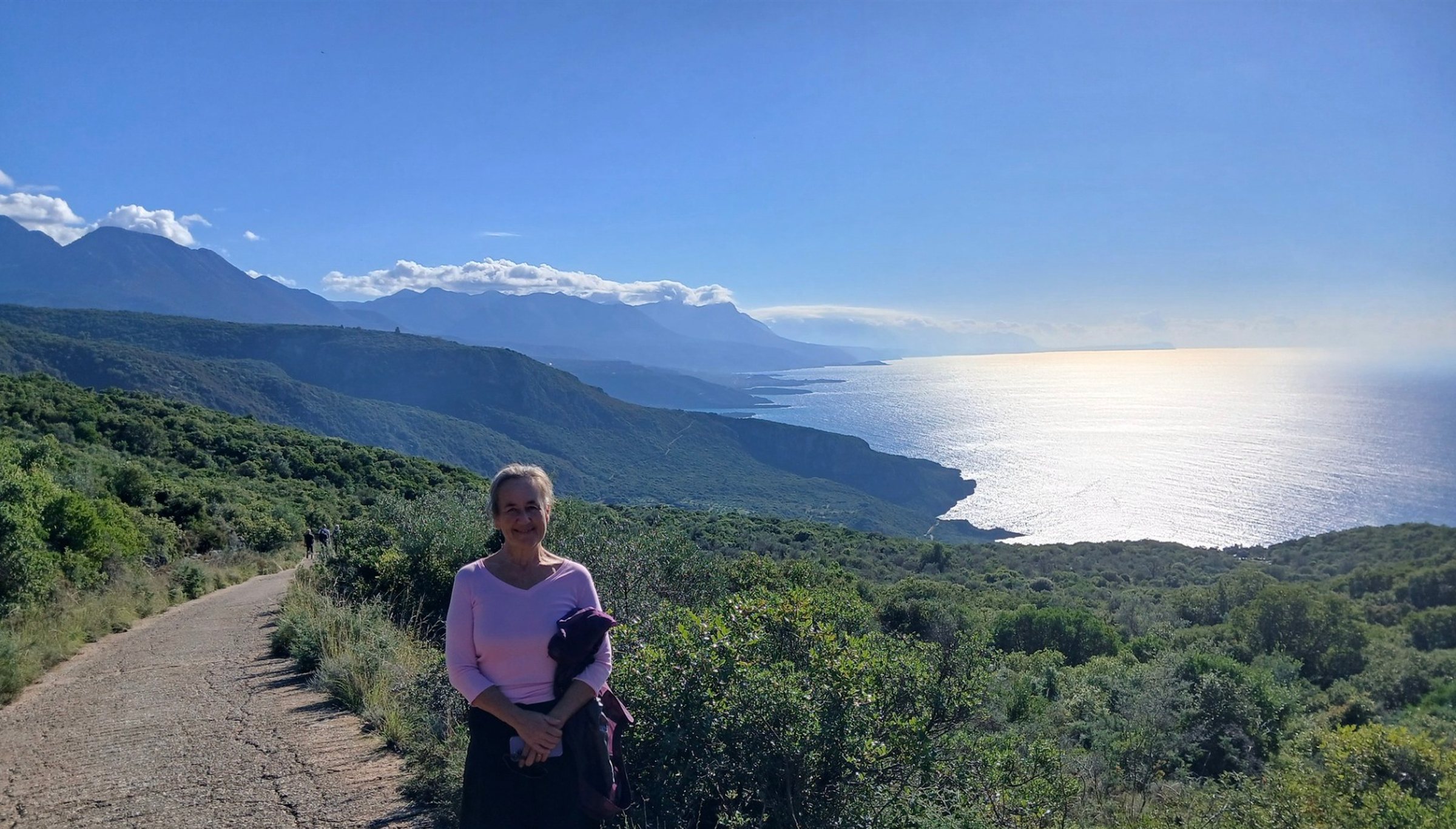 Moneca Kaiser on a coastal path above the sea in the Mani, Greece